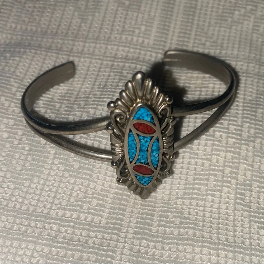vintage Southwestern-style cuff bracelet, lfeaturing turquoise and coral chip